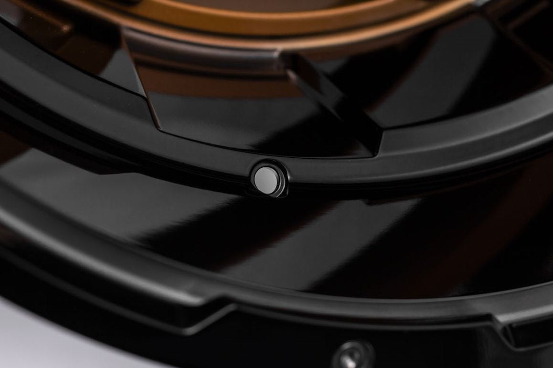 Product of Grid Wheels 17x9 Bronze With Black Lip Wheel - 6x4.72 Bolt Pattern