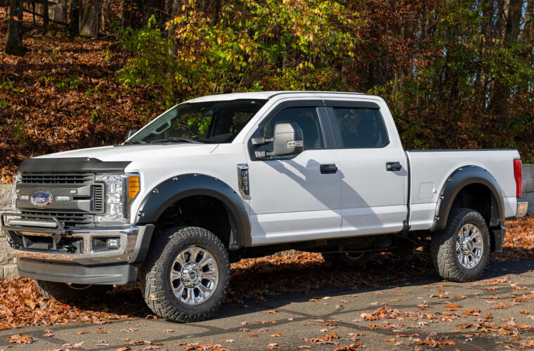 Product of Bushwacker 20942-02 Pocket Style/ Exposed Fasteners Black Fender Flare - Set Of 4