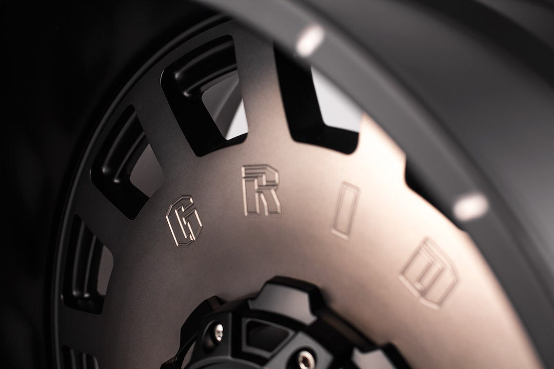 Product of Grid Wheels 18x9 Black With Metallic Dust Face Wheel - 6x5.50 Bolt Pattern