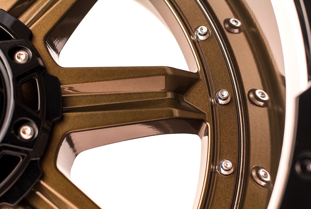 Product of Grid Wheels 17x9 Bronze With Black Lip Wheel - 6x5.31 Bolt Pattern