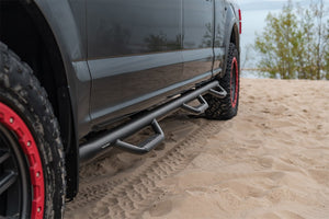 Product of N-Fab F1596CC-6-TX Black Matte Textured Powder Coated Round Nerf Bar - Truck Wheel To Wheel 