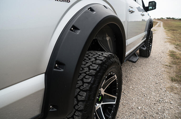 Product of Lund International RX133T Pocket Style/ Exposed Fasteners Black Fender Flare - Set Of 4 