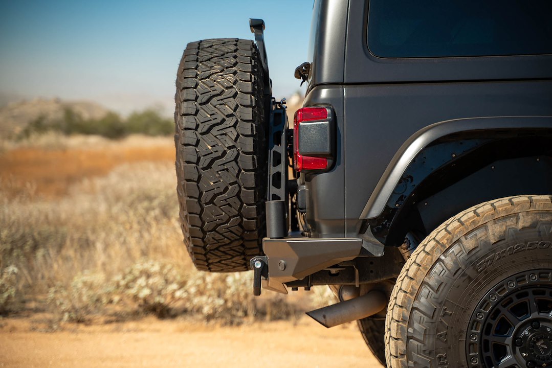 Dv8 Offroad Tcjl-13 Spare Tire Carrier||jeep-Jl-Bumper-Mounted-Tire-Carrier_Installed-01.Jpg||92||dv8tcjl13||1629477