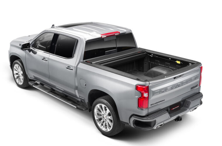Product of Roll-N-Lock E-Series Hard Power Retractable RC263E Tonneau Cover 