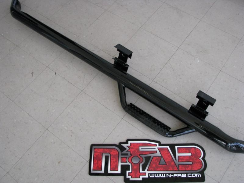Product of N-Fab F9946RC Cab Length Nerf Bar With Drop Down Steps 
