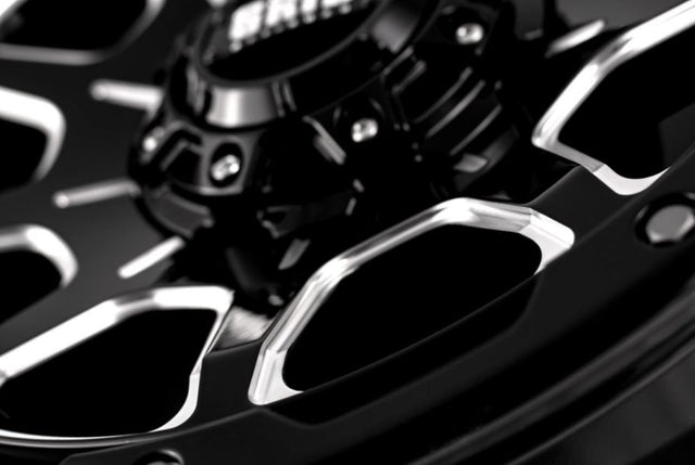 Product of Grid Wheels 17x9 Black With Natural Accents Wheel - 6x5.31 Bolt Pattern 