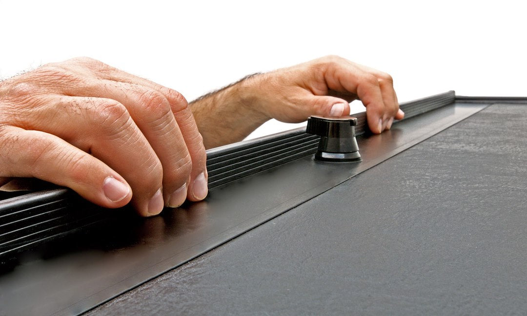 Product of Roll-N-Lock M-Series Hard Manual Retractable LG576M Tonneau Cover 