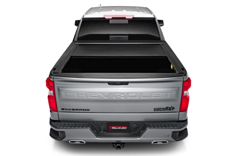 Product of Roll-N-Lock E-Series Hard Power Retractable RC263E Tonneau Cover 