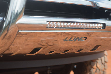 Product of Lund International 47021212 Bull Bar Polished 3-1/2 Inch Yes with skid plate 