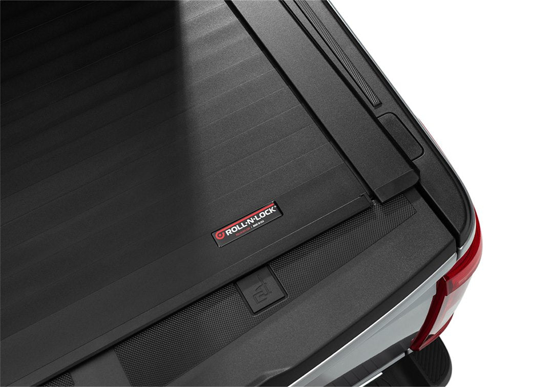Roll-N-Lock Rc132e Tonneau Cover||e-Series_21ford-F150_Details_04badge.Jpg||91||r75rc132e||1008608