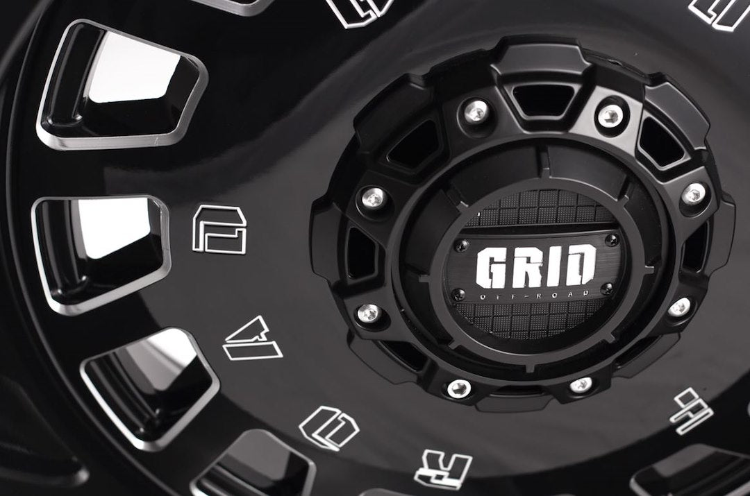 Product of Grid Wheels 18x9 Black With Natural Accents Wheel - 5x5.12 Bolt Pattern 