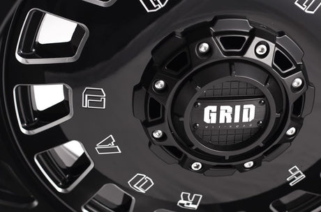 Product of Grid Wheels 18x9 Black With Natural Accents Wheel - 5x5.12 Bolt Pattern 