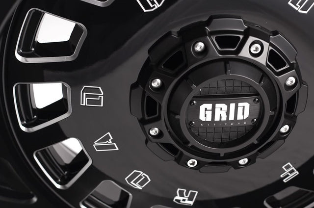 Product of Grid Wheels 18x9 Black With Natural Accents Wheel - 5x5.12 Bolt Pattern 