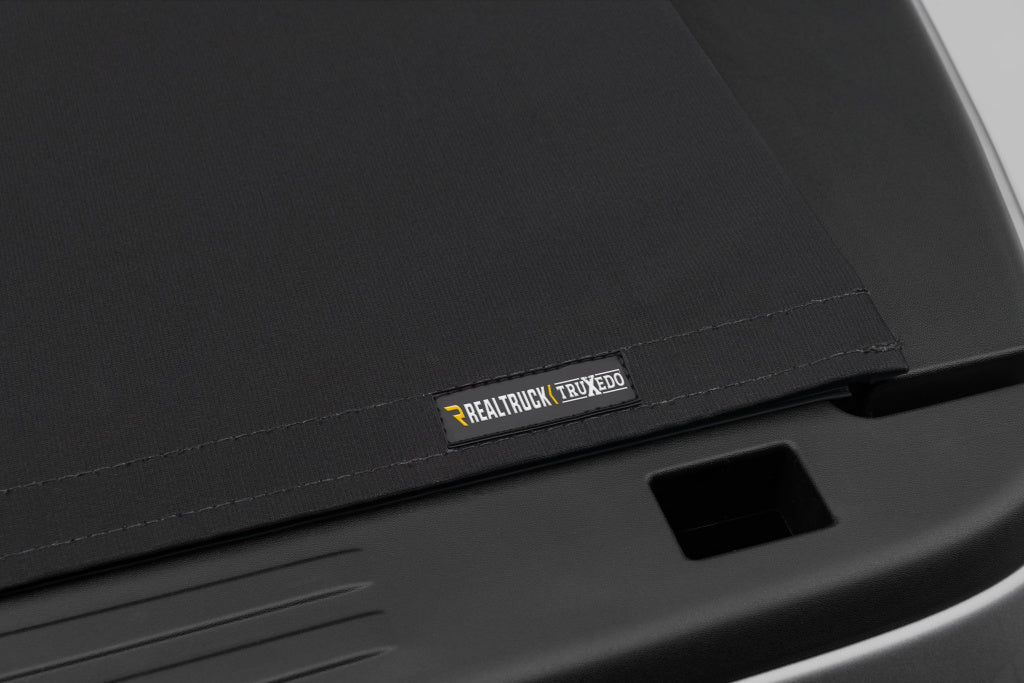 Truxedo 1487001 Tonneau Cover||tx_Prox15_19ram_Details_06badge_Rt.Jpg||95||t701487001||1731547