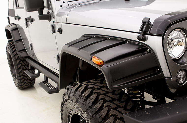 Product of Lund International RX133T Pocket Style/ Exposed Fasteners Black Fender Flare - Set Of 4 