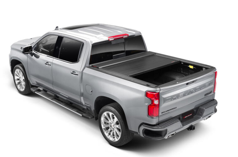 Product of Roll-N-Lock E-Series Hard Power Retractable RC263E Tonneau Cover 