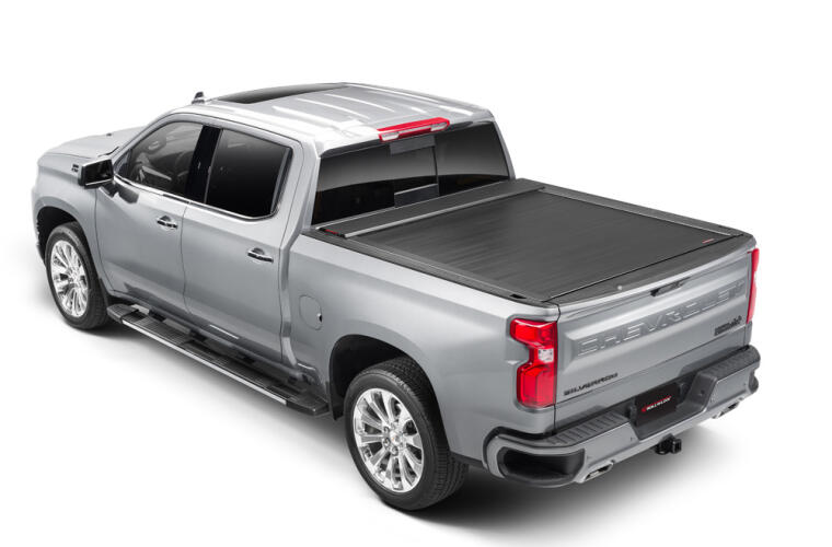 Product of Roll-N-Lock E-Series Hard Power Retractable RC263E Tonneau Cover 