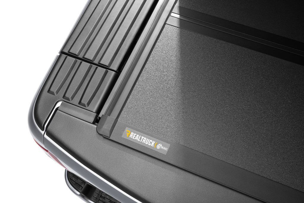 Product of BAK Industries BAKFlip MX4 Hard Folding 448207RB Tonneau Cover 