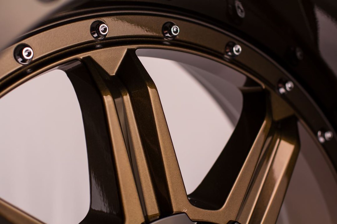 Product of Grid Wheels 18x9 Bronze With Black Lip Wheel - 6x5.31 Bolt Pattern 