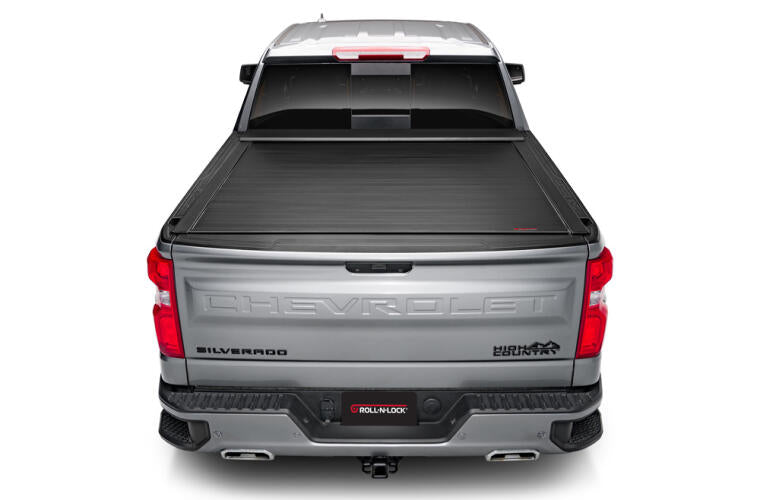 Product of Roll-N-Lock E-Series Hard Power Retractable RC263E Tonneau Cover 