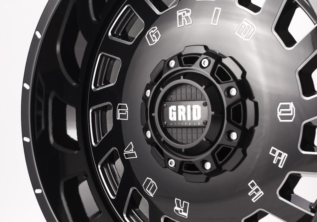 Product of Grid Wheels 18x9 Black With Natural Accents Wheel - 5x5.12 Bolt Pattern 