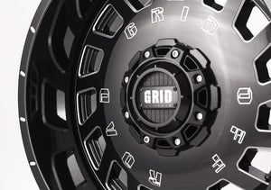 Product of Grid Wheels 18x9 Black With Natural Accents Wheel - 5x5.12 Bolt Pattern 