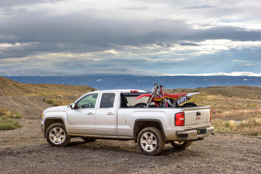 Product of BAK Industries BAKFlip F1 Hard Folding 772133 Tonneau Cover 