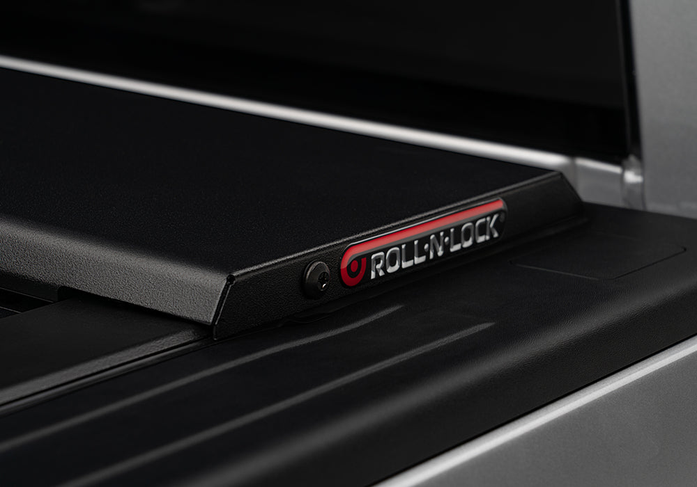 Product of Roll-N-Lock E-Series Hard Power Retractable RC575E Tonneau Cover 