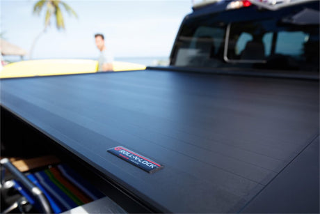 Product of Roll-N-Lock E-Series Hard Power Retractable RC575E Tonneau Cover 