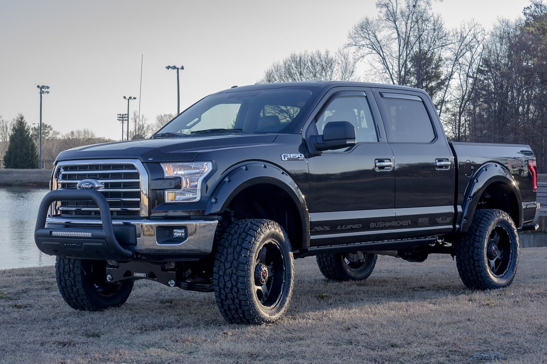 Product of Lund International 47121206 Bull Bar Black Wrinkle Powder Coated 3-1/2 Inch Yes with skid plate 