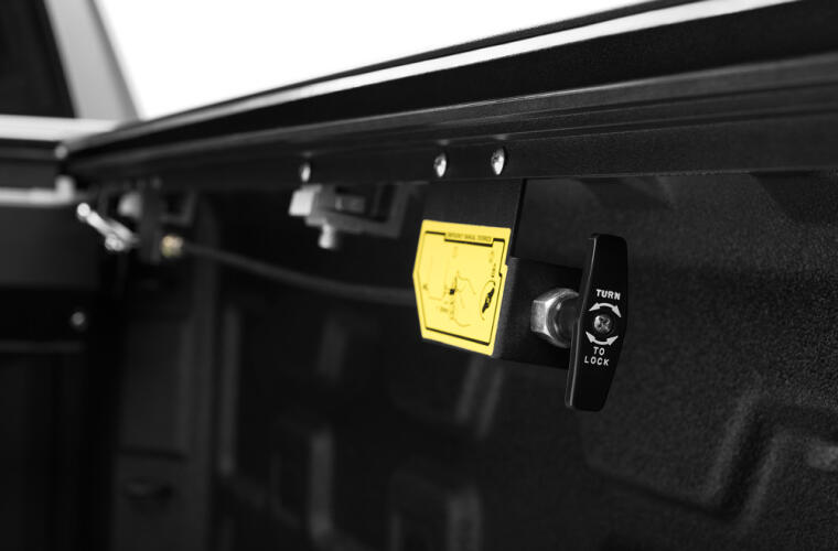 Product of Roll-N-Lock E-Series Hard Power Retractable RC263E Tonneau Cover 